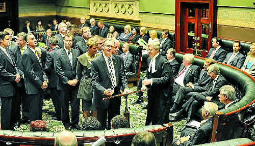 Member for Clarence Steve Cansdell is sworn in as parliamentary secretary to the Minister for Police. Member for Clarence Steve Cansdell is sworn in as parliamentary secretary to the Minister for Police.